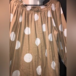 tan and white polka dot shirt